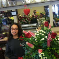 <p>Jasmine Rivera, manager at Stamford Florist Flowers &amp; Gifts at 625 Bedford St., said Valentine&#x27;s Day is one of the busiest days of the year for the business.Floral designer Gerardo Restrepo is seen in the background.</p>
