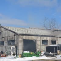 <p>Firefighters on Tuesday afternoon  battled a blaze at a storage building near North Salem Road in Southeast on Tuesday.</p>