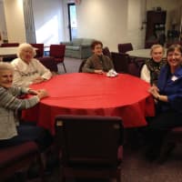 <p>The Village Lutheran Church hosts a presentation by Kathryn Galchutt, far right, associate professor of history at Concordia College. </p>