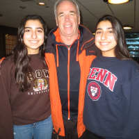 <p>Ellie and Karen Seid, All-America honorees, with Mamaroneck field hockey coach John Savage.</p>