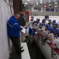 <p>Mahopac coach Chris Lombardo instructs his team during timeout.</p>