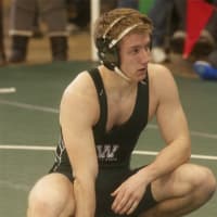 <p>Daniel Kraemer of Woodlands pauses during his match at 160.</p>
