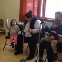 <p>Parents and kids enjoy playing together in the special Valentine&#x27;s Day drum circle at the Li&#x27;l Peeps Creative Music Program at The Cortlandt School of Performing Arts. </p>