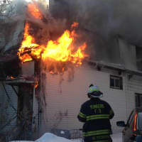 <p>Firefighters encountered heavy flames when they arrived at the scene at 39 Locust Hill Ave. in Yonkers late Wednesday afternoon.</p>