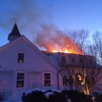 <p>Fairfield Fire Department sets up to fight fire at 33 Chester Place.</p>