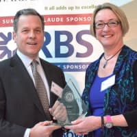<p>At the 2014 event,Bob McKillip accepts the 2014 SPEF Corporate Award on behalf of  RBS from SPEF Executive Director Sue Rigano.</p>
