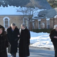 <p>Attendees leave a memorial service held for Walter Liedtke at St. Matthew&#x27;s Episcopal Church in Bedford.</p>