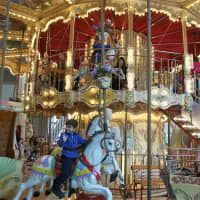 <p>Children of all ages enjoy the carousel.</p>