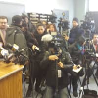 <p>News reporters await Monday&#x27;s news conference at Harrison Police Headquarters.</p>