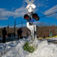 <p>The Commerce Street railroad crossing in Valhalla were six people were killed in a train-SUV collision earlier this month.</p>