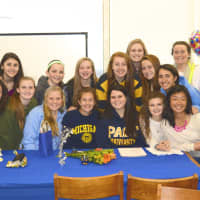 <p>Sarah Bard takes a picture with Lakeland High teammates after signing a letter of intent to play field hockey at Pace University.</p>