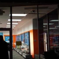 <p>As you pass by Harrison Shopping Center at night, the new AT&amp;T catches attention.</p>