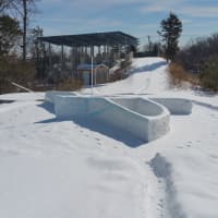 <p>Recent snow fall followed by mostly sunny days hasn&#x27;t done much to change the to-scale sculpture of Gustave Whitehead&#x27;s first-in-flight airplane made by local artist Craig Smith.</p>