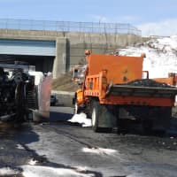 <p>A box truck was knocked on its side after colliding with a tractor trailer on I-95 southbound in Norwalk Tuesday morning.</p>