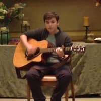 <p>A student showcased his talents at the inaugural Irvington Middle School open mic night. </p>