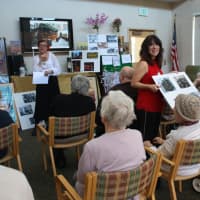 <p>Guests at Waveny LifeCare Network in New Canaan listen to a talk at the &quot;Around the World&quot; event.</p>