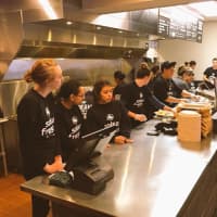 <p>A customer prepares to order at the new Salsa Fresca in Danbury with the newly trained employees ready to go. </p>