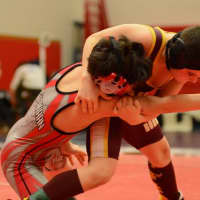 <p>Artie Cocchia takes down an opponent en route to a regional title. The Norwalk Mad Bull wrestler is the No. 1 seed for the upcoming state tournament.</p>