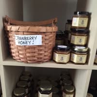 <p>There&#x27;s lots of honey and other items for sale at Red Bee Honey.</p>