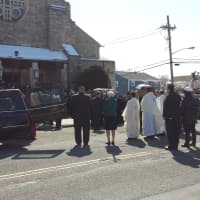 <p>Priests, police and firefighters encircled the funeral procession as the Hochman girls&#x27; caskets were carried from the church.</p>