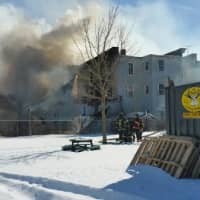 <p>At least three houses were damaged in a large fire on Hanover Street in Bridgeport on Friday.</p>