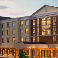 <p>A rendering of the proposed 100-room hotel for the Crossroads 312 project in Southeast.</p>