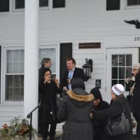 <p>Attendees leave Mount Kisco&#x27;s Cassidy-Flynn Funeral Home after the service for train-crash victim Robert Dirks.</p>