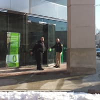 <p>Rye police outside TD Bank, 38 Purchase St., on Monday afternoon.</p>