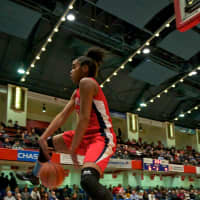 <p>Clare Taylor keeps the ball inbounds.</p>