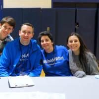 <p>Both students and volunteers celebrate the success of a blood drive at Briarcliff High School on Feb. 13. </p>