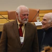 <p>Jeffrey G. Miller, the namesake of the competition, with a professor. </p>