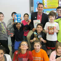 <p>Hendrick Hudson Schools Superintendent Joseph Hochreiter visited Furnace Woods and participated in the day that promoted reading.</p>