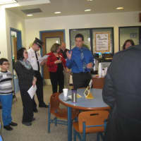 <p>Edison Principal Ivan Tolentino addresses guests and some students in the school library at the opening of the days events.
 </p>