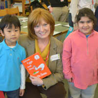 <p>Bedford school board member Suzanne Grant poses for a photo with kids at Bedford Hills Elementary School.</p>
