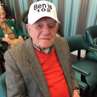 <p>Benjamin Vinokur&#x27;s cap says it all: Ben is 102.</p>