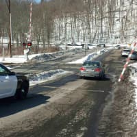 <p>A vehicle was reported to have gotten stuck at a grade crossing in Chappaqua, backed up and broke off a gate, which is pictured at right.</p>