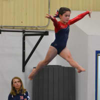 <p>Darien Level 4 gymnast Jane Tortorella leaped to third place on beam at the Connecticut YMCA Southern Leagues Championship meet. </p>