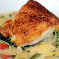 <p>Parmesean-crusted cod at Eastchester Fish Gourmet.</p>