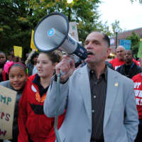 <p>Protesters gather outside Peekskill City Hall to oppose a proposed budget. </p>