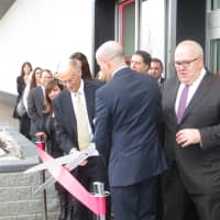 <p>Greenburgh Town Supervisor Paul Feiner, left, with executives from Saks and Hudson&#x27;s Bay Company during a ribbon-cutting ceremony on Wednesday.</p>