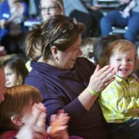<p>Parents and children join in the birthday celebration at Stepping Stones Museum for Children.</p>