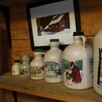 <p>New York Maple Syrup jugs on display.</p>