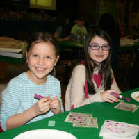 <p>Pound Ridge Elementary School third-graders Ellie OBrien and Alexandra Weinstein enjoy the school&#x27;s annual bingo night. 
</p>