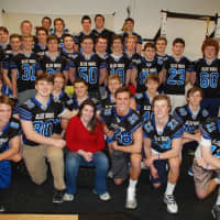 <p>Darien football players get ready for &quot;Lifting Grace.&quot;</p>