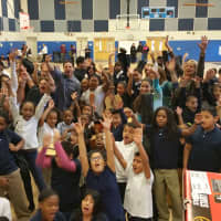 <p>Students at Bridgeport&#x27;s Roosevelt School show off the donation of musical instruments. </p>