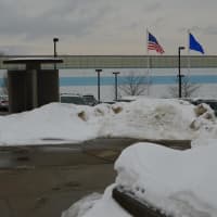 <p>Parking lots are cleared, but piles of snow obscure the view. </p>