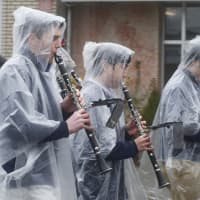 <p>Staying dry wasn&#x27;t easy at the parade..</p>