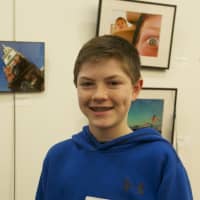 <p>Kace Stewart, 13, of Wilton, in front of his entry.</p>