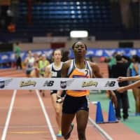 <p>Western Branch, Va., sets a new U.S. high school record in the 4x800 relay as Mamaroneck&#x27;s foursome (to the left) places fourth in the nation.</p>