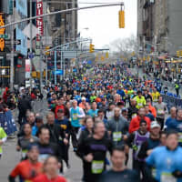<p>Runners make their way along the course during Sunday&#x27;s New York City Half Marathon.</p>